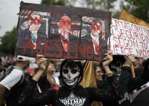 Generations of students remember 1968 massacre in march through Mexico City